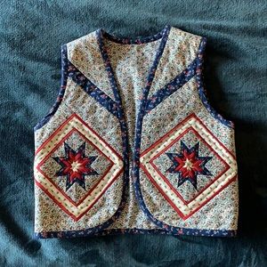 Vintage 1970’s hand quilted vest. Intricate star pattern.